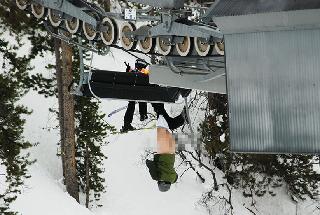 Naked Skier in Vail Colorado Hangs on From His Pants After Falling Through Ski Lift Chair